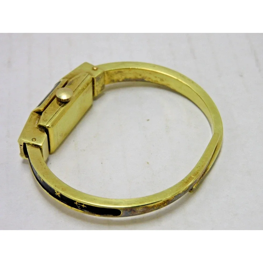 Vtg Swiss Hidden Face Watch Bangle Bracelet Black Enamel Gold Tone JC245